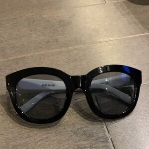 Oversized Black Sunglasses with White Striped Arms (Mod / Retro Style)